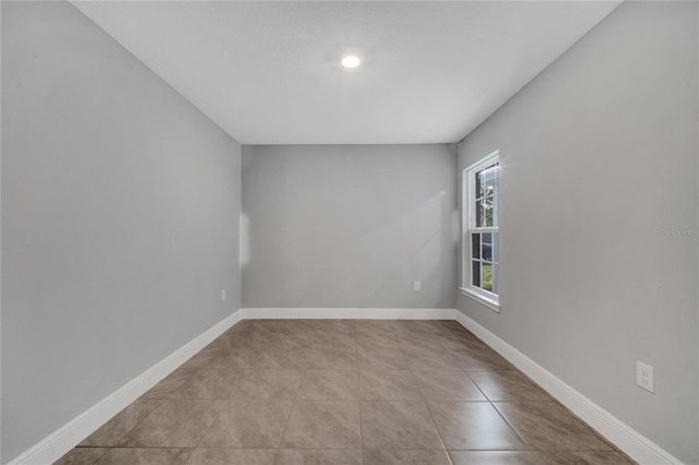 view of tiled spare room