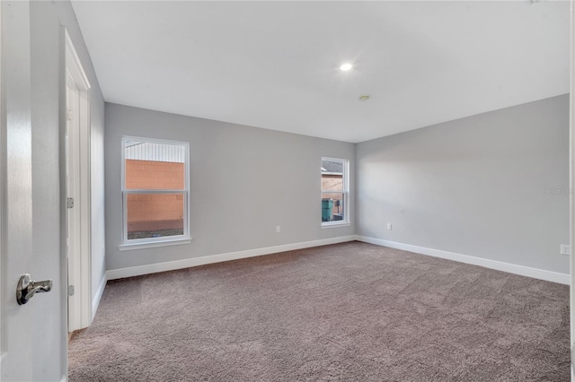 view of carpeted spare room