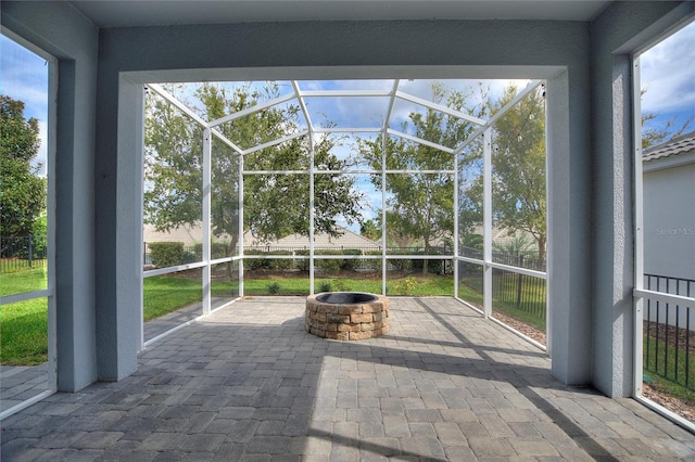 unfurnished sunroom with vaulted ceiling