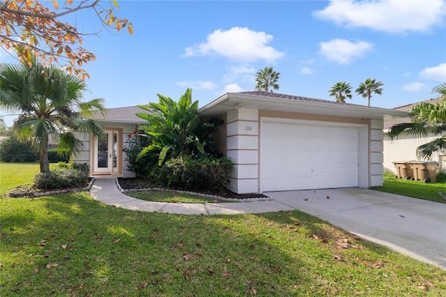 ranch-style house with a garage and a front yard