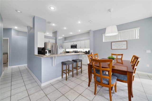 view of tiled dining room