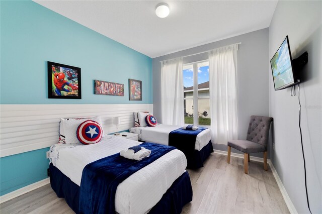 bedroom featuring light wood-type flooring