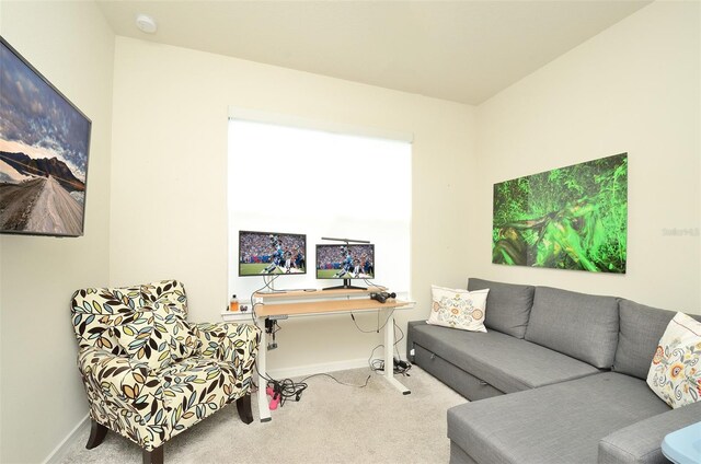 4963 Royal Point Ave, Kissimmee, FL 34746 - carpeted living area with baseboards
