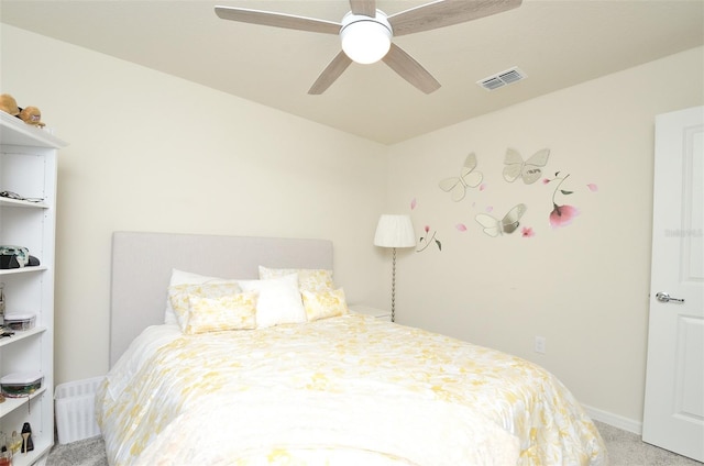 bedroom featuring light carpet and ceiling fan