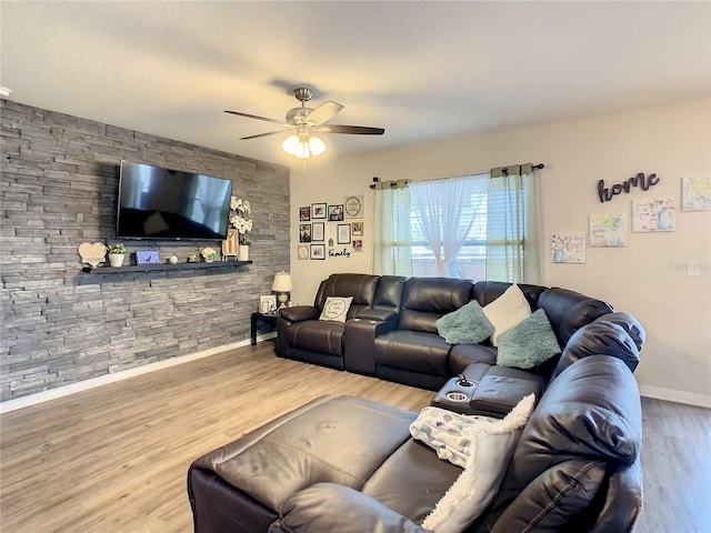1927 Partin Terrace Rd, Kissimmee, FL 34744 - living area with ceiling fan, wood finished floors, and baseboards