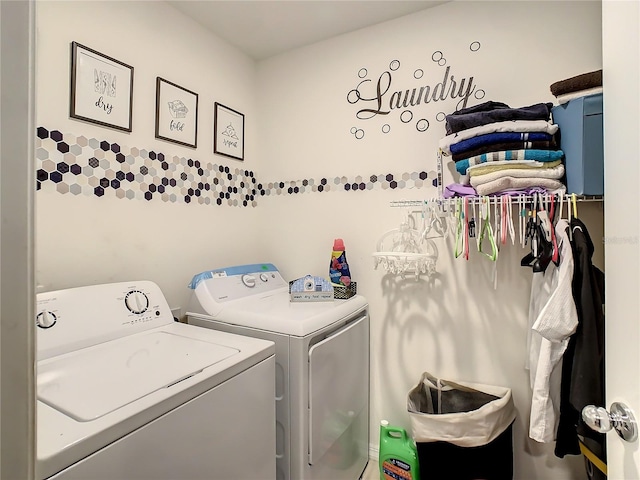 laundry area with washing machine and dryer