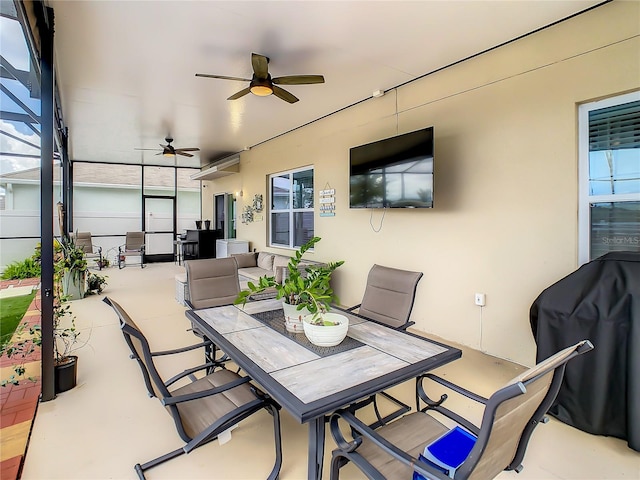 view of patio featuring ceiling fan