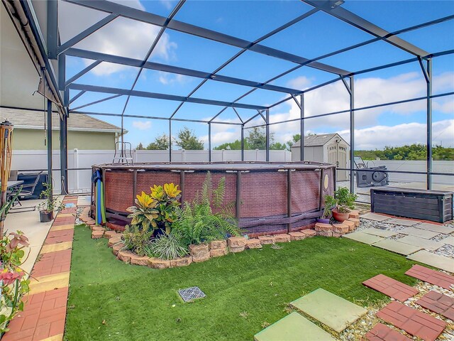 1927 Partin Terrace Rd, Kissimmee, FL 34744 - view of yard with a hot tub, a patio, and glass enclosure
