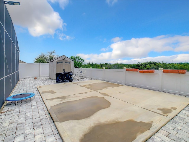 view of patio with a shed