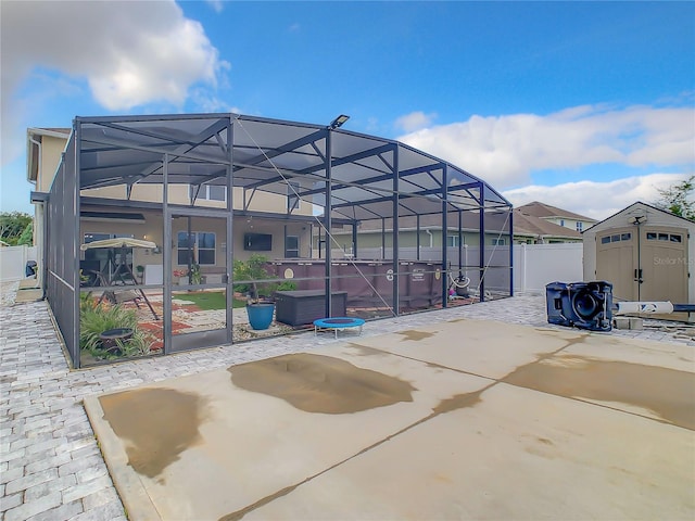 1927 Partin Terrace Rd, Kissimmee, FL 34744 - view of patio / terrace featuring a lanai and a hot tub