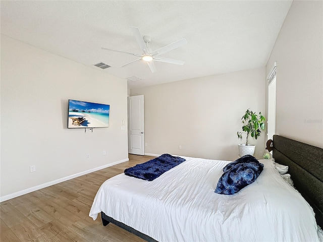 bedroom featuring ceiling fan and wood-type flooring