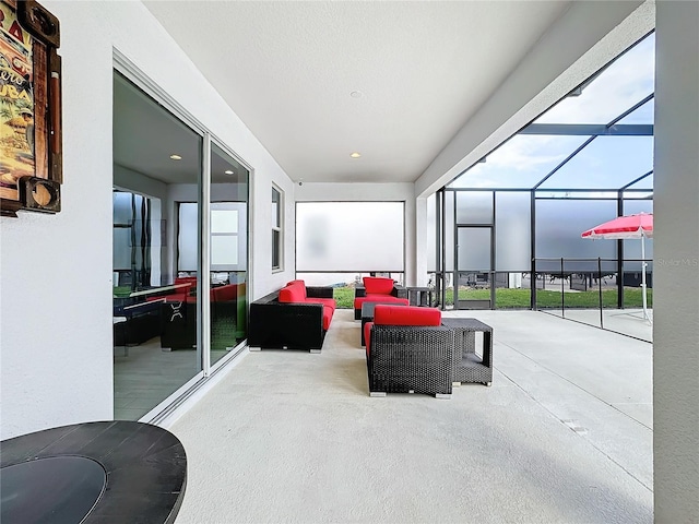 view of patio / terrace featuring outdoor lounge area and a lanai