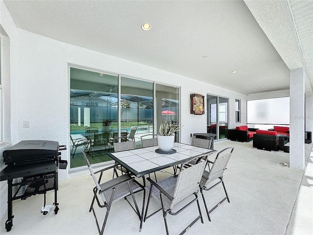 view of patio / terrace featuring outdoor lounge area and a grill