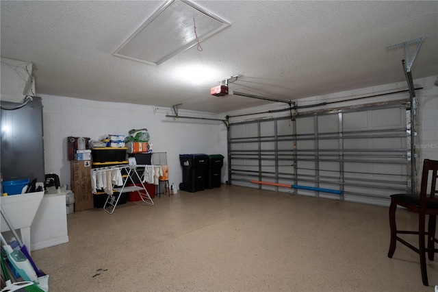 garage featuring a garage door opener