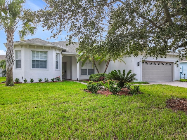 ranch-style home featuring a front yard and a garage