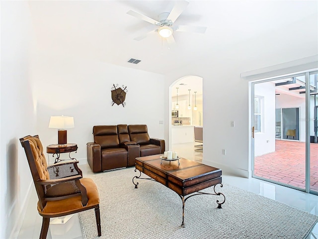 living room featuring ceiling fan