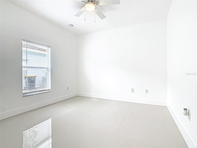 unfurnished room featuring ceiling fan