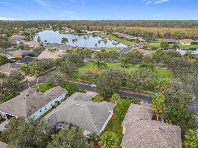 drone / aerial view with a water view