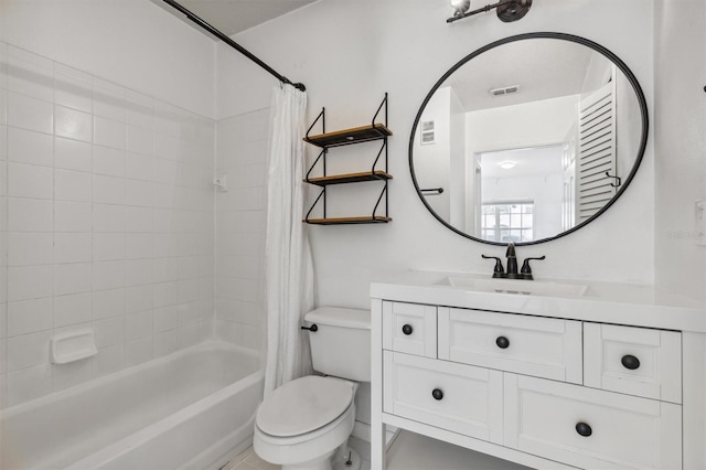 full bathroom featuring vanity, shower / bath combo, and toilet