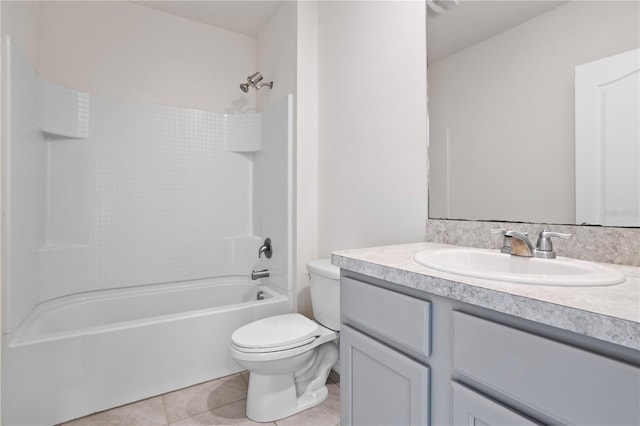 full bathroom with tile patterned floors, vanity, bathtub / shower combination, and toilet