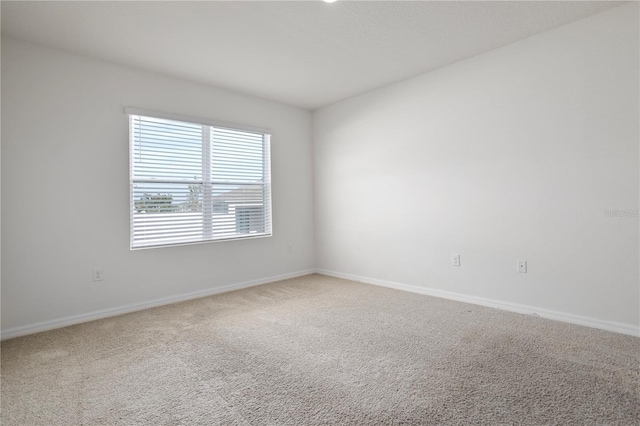 empty room with carpet flooring