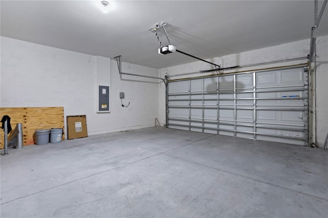 garage featuring electric panel and a garage door opener