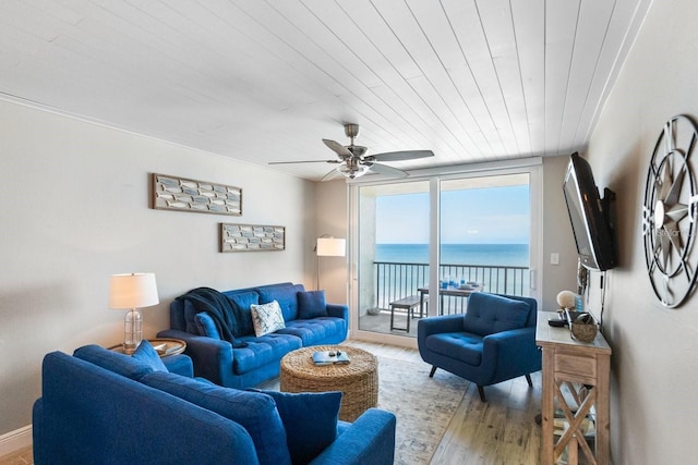 living room with ceiling fan, wooden ceiling, and light hardwood / wood-style floors