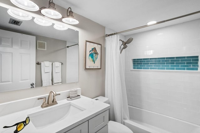 full bathroom featuring toilet, shower / tub combo, and vanity