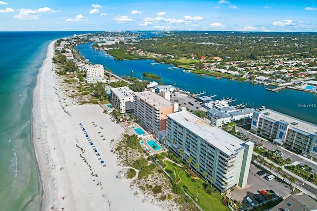 drone / aerial view featuring a view of the beach and a water view