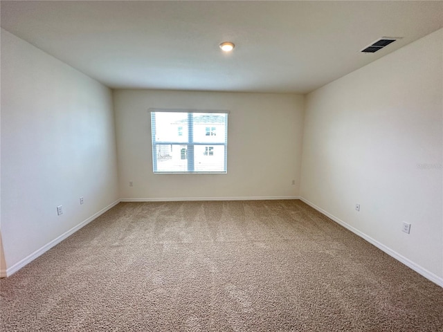 empty room with carpet floors