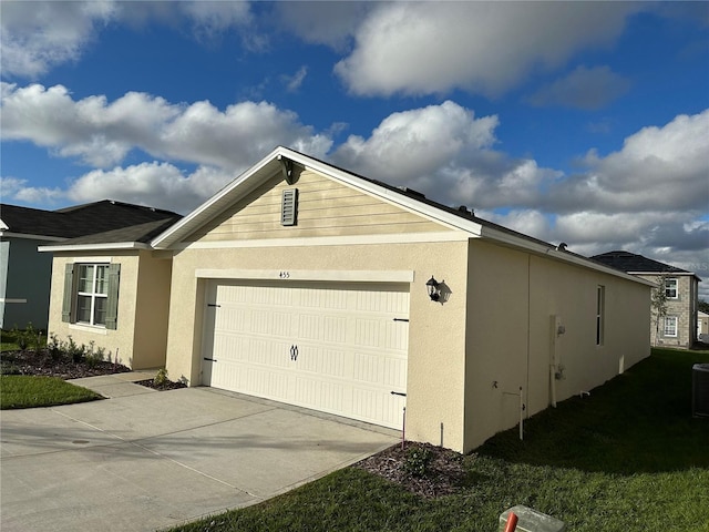 view of side of property featuring a garage