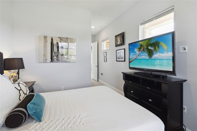 bedroom with multiple windows