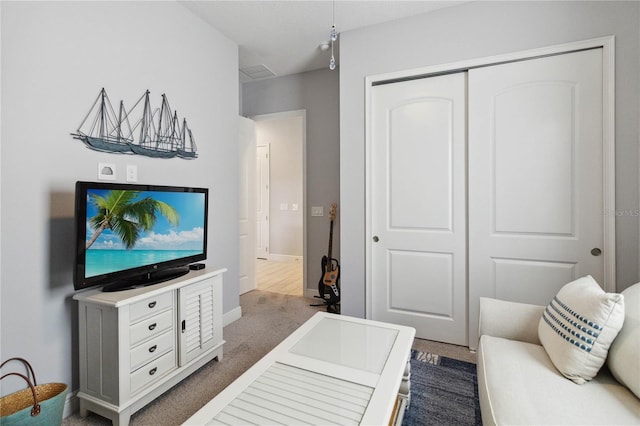 5075 Twin Lakes Blvd, Saint Cloud, FL 34772 - living room with dark carpet and baseboards