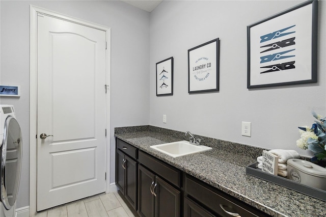 5075 Twin Lakes Blvd, Saint Cloud, FL 34772 - bathroom featuring washer / clothes dryer and vanity