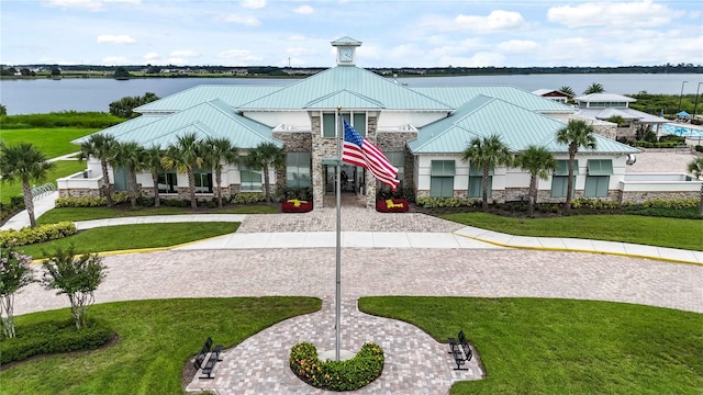 view of building exterior with a water view