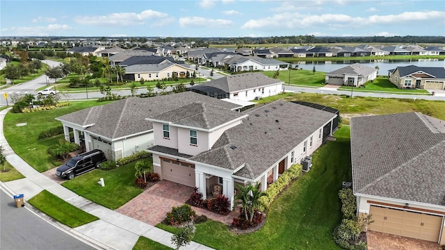 5075 Twin Lakes Blvd, Saint Cloud, FL 34772 - aerial view of residential area featuring a large body of water