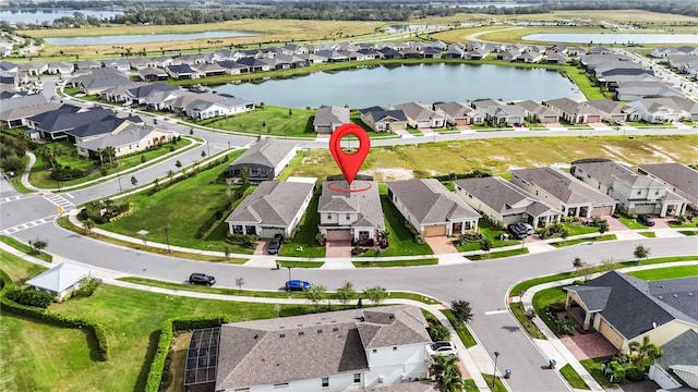 5075 Twin Lakes Blvd, Saint Cloud, FL 34772 - aerial view of property and surrounding area with nearby suburban area and a nearby body of water