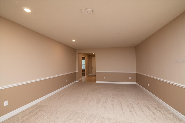 spare room featuring carpet flooring