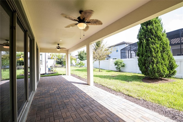 view of patio with ceiling fan