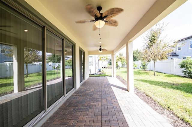 view of patio / terrace featuring ceiling fan