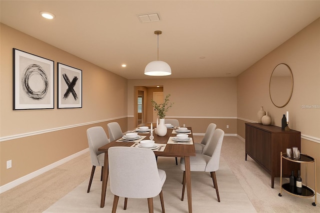 7845 Wandering Way, Orlando, FL 32836 - dining room with light colored carpet, baseboards, and recessed lighting