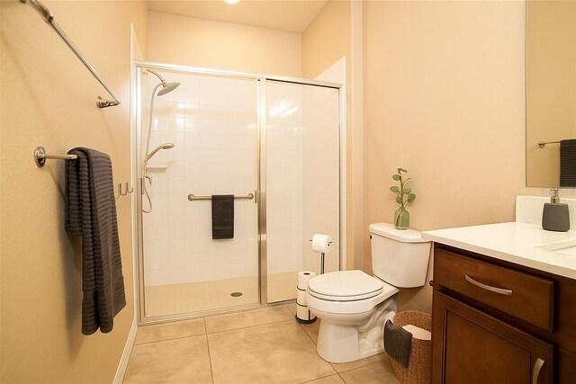 7845 Wandering Way, Orlando, FL 32836 - full bathroom with toilet, vanity, a shower stall, and tile patterned flooring