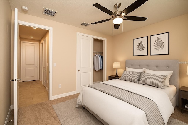 7845 Wandering Way, Orlando, FL 32836 - carpeted bedroom with a closet, baseboards, recessed lighting, a ceiling fan, and tile patterned flooring