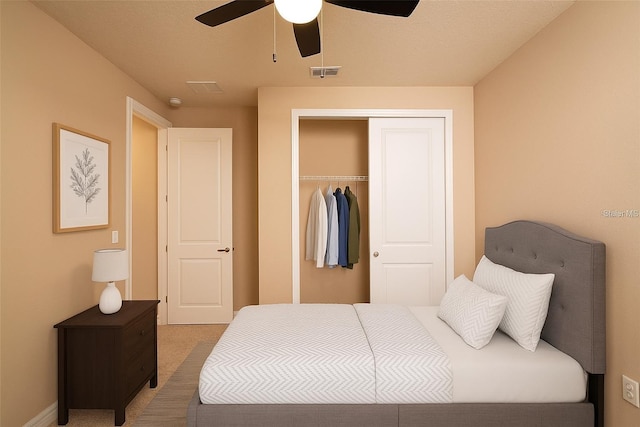 7845 Wandering Way, Orlando, FL 32836 - bedroom with a closet, carpet flooring, ceiling fan, and baseboards