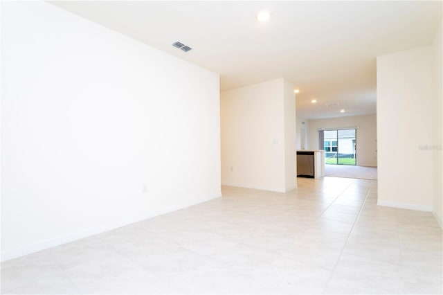 view of tiled spare room