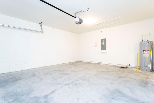 garage featuring electric water heater, a garage door opener, and electric panel