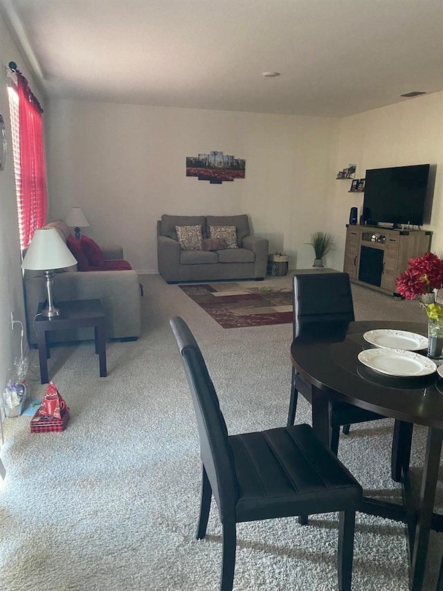 view of carpeted dining room