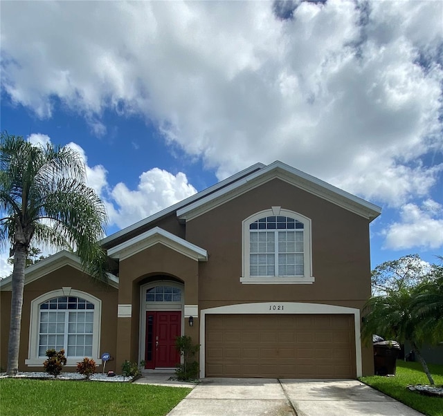 view of front of home with a garage