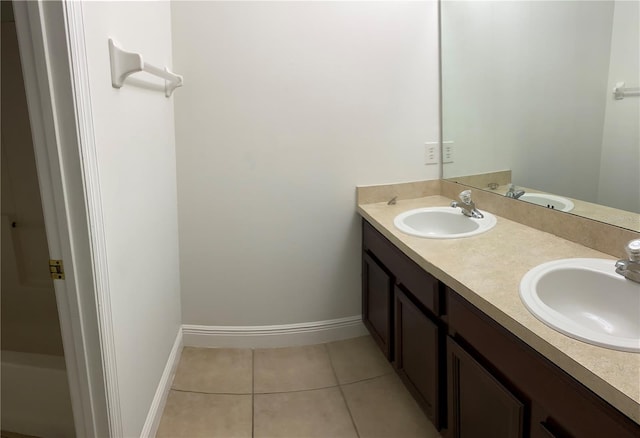 bathroom with vanity and tile patterned floors