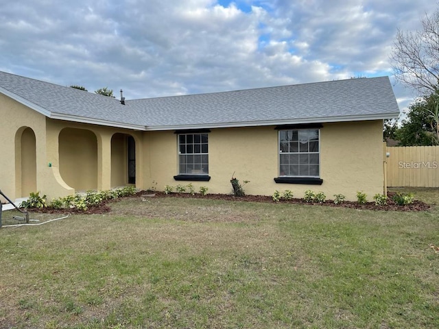 view of home's exterior with a yard